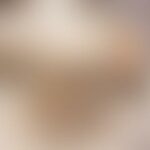 A close-up of a delicious sandwich with multiple layers of ingredients.