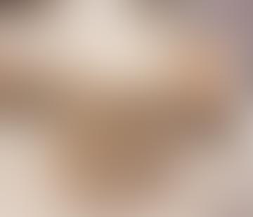 A close-up of a delicious sandwich with multiple layers of ingredients.