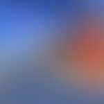 A blurry image with blue and orange hues.